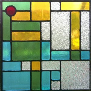 Chaos and Order: a visual puzzle in stained glass